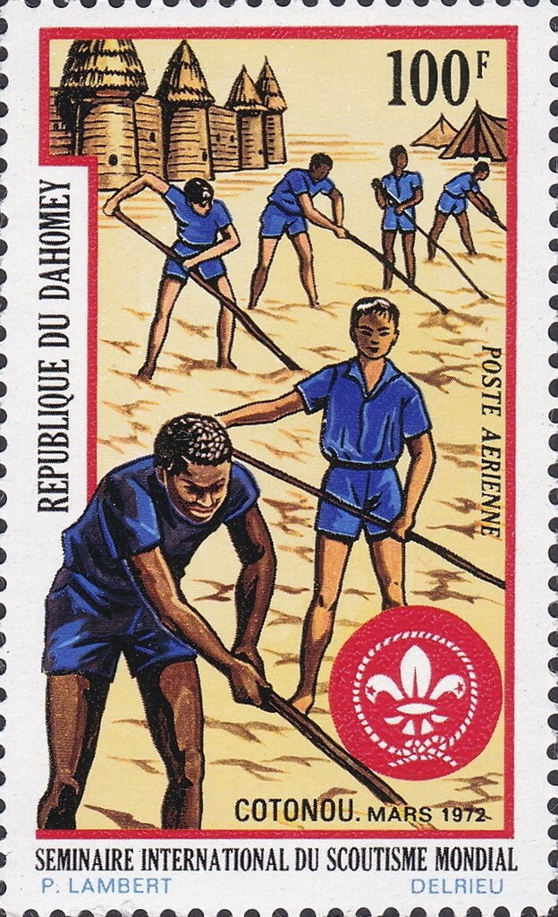 Scouts hoeing a field