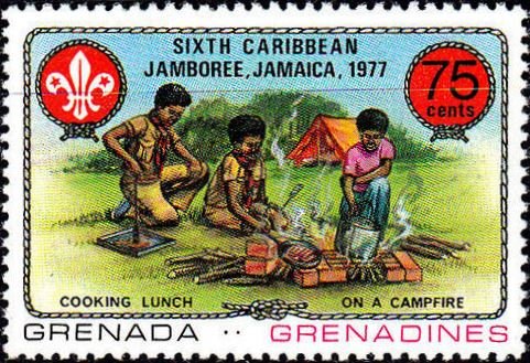 Cooking lunch on a camp-fire