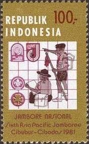 Scout with staff and seated Scout